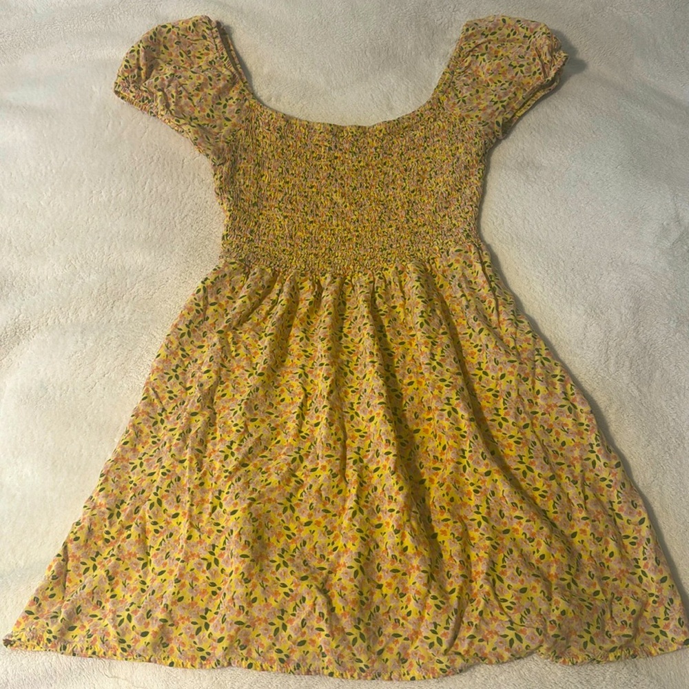 floral dress. off the shoulders with fitted top and puffy sleeves